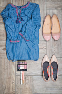 High angle view of shoes on wooden floor