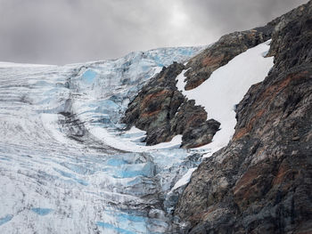 Scenic view of snowcapped mountain against sky