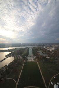 Aerial view of cityscape against sky