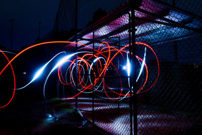 Light trails on illuminated city at night