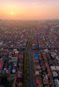 High angle view of townscape against sky during sunset