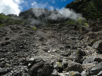 Scenic view of volcanic landscape against sky