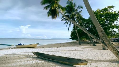 Scenic view of beach against sky