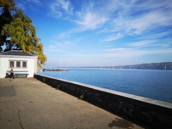 Scenic view of sea against blue sky