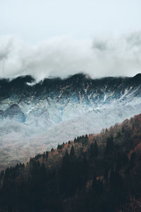 Scenic view of snowcapped mountains against sky