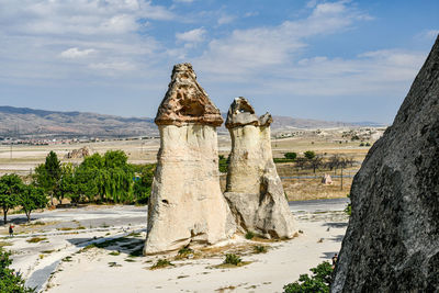 Scenic view of rock formation against sky