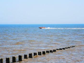 Scenic view of sea against clear sky