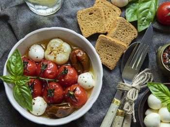 High angle view of fruits in bowl on table