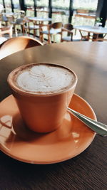 Close-up of coffee cup on table