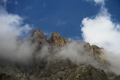 Panoramic view of rocks against sky