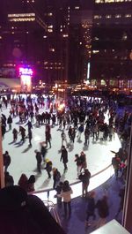 Crowd in city at night