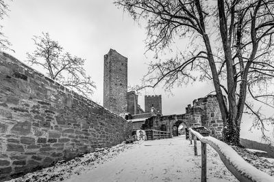 Buildings against sky during winter