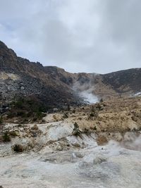 Scenic view of land against sky