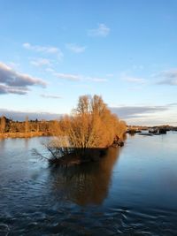 Scenic view of river against sky