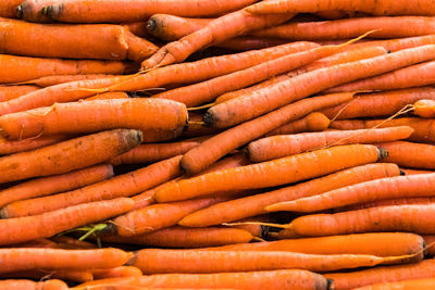 Full frame shot of carrots for sale at market