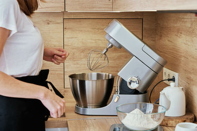 Woman cooking homemade cake