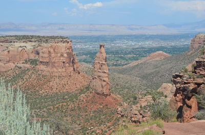 Panoramic view of rock formations against sky