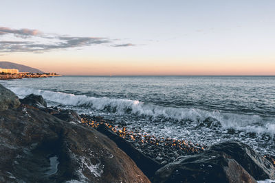 Scenic view of sea against sky during sunset