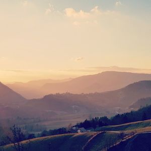 Scenic view of landscape against sky during sunset