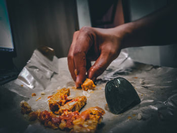 Midsection of person preparing food