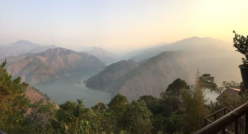 Scenic view of mountains against sky during sunset