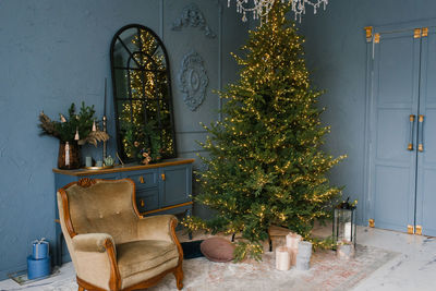 Christmas and new year decorate the dark interior of the room. a festively decorated room