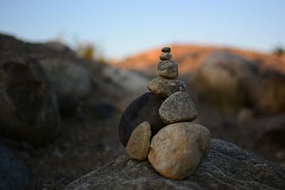 Close-up of stone stack on rock