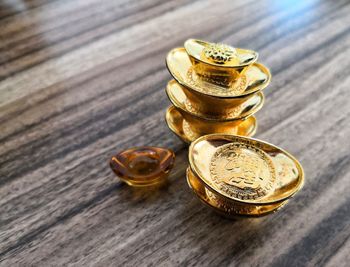 High angle view of coins on table