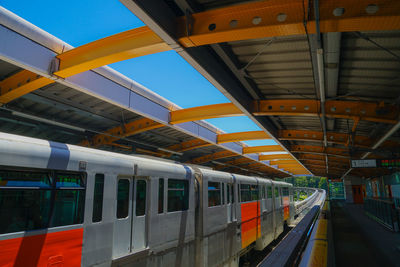 Blurred motion of train at railroad station