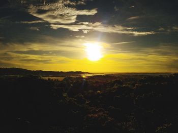 Scenic view of landscape against sky during sunset