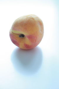 Close-up of apple against white background