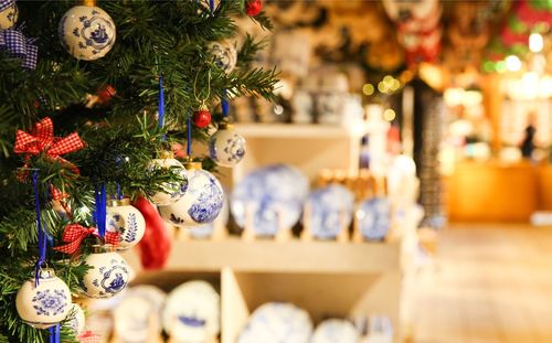 Close-up of decorated christmas tree at shop