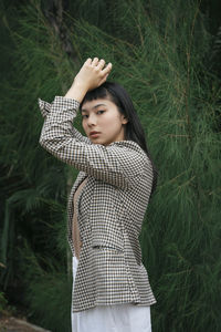 Young woman standing on land