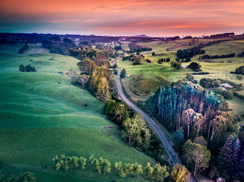 Scenic view of golf course against sky