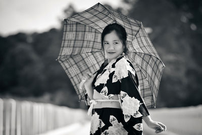 Portrait of cute girl outdoors