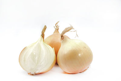 Close-up of garlic against white background