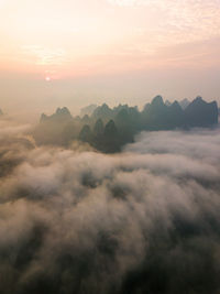 Scenic view of cloudscape against sky during sunset