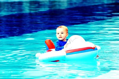 Boy in swimming pool