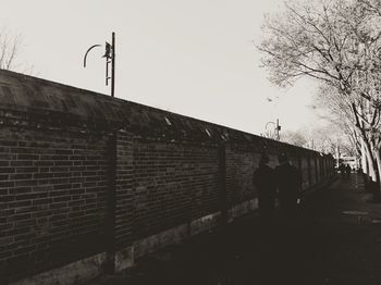 Man walking against clear sky