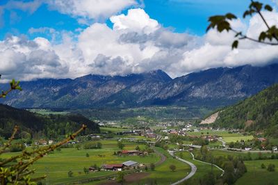 Scenic view of landscape and mountains against sky