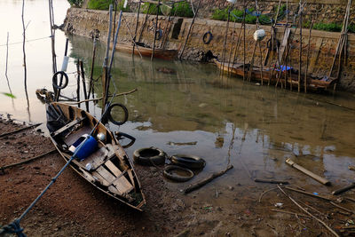 Abandoned boat on shore