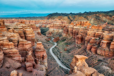 Scenic view of rock formations against sky