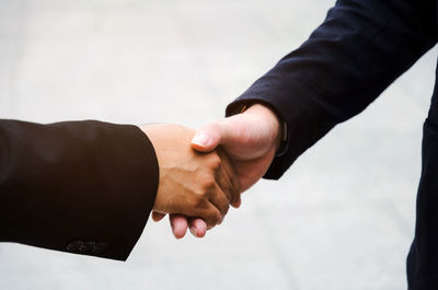 Cropped image of business coworkers shaking hands