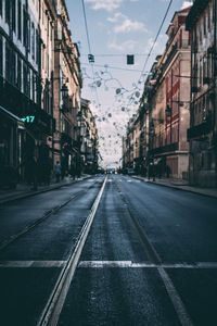 Road in city against sky