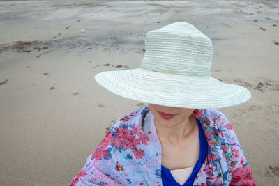 Woman standing at beach