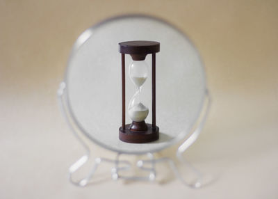 High angle view of clock on table