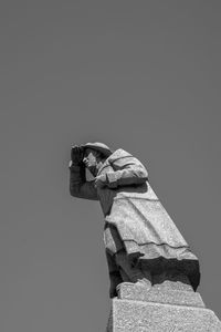 Low angle view of statue against clear sky