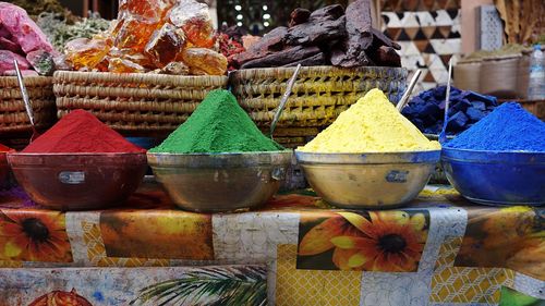 Multi colored vegetables for sale at market stall