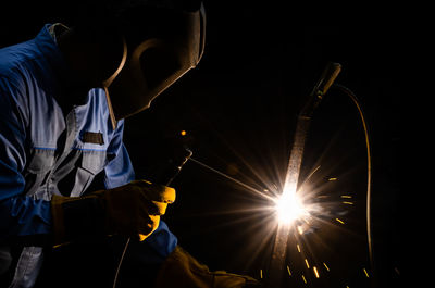 Man working on metal