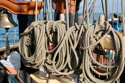 Close-up of ropes hanging on ship